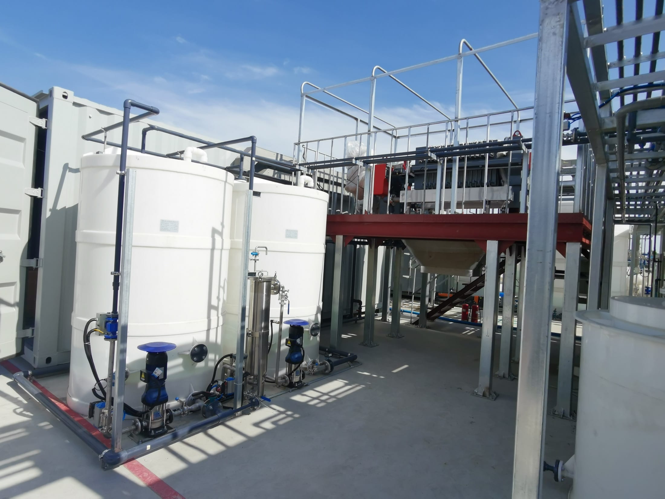 Installed conditioning, solids-separation, and sludge-removal equipment relevant to waste salt and fly ash wash water resource-recovery routes